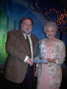 Photo of Ted Gast, with ACS President Ann Nally, and the Outstanding Performance, Large Section, Award